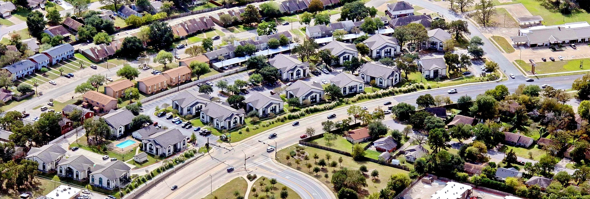 an aerial view of a residential neighborhood at The West University Gardens